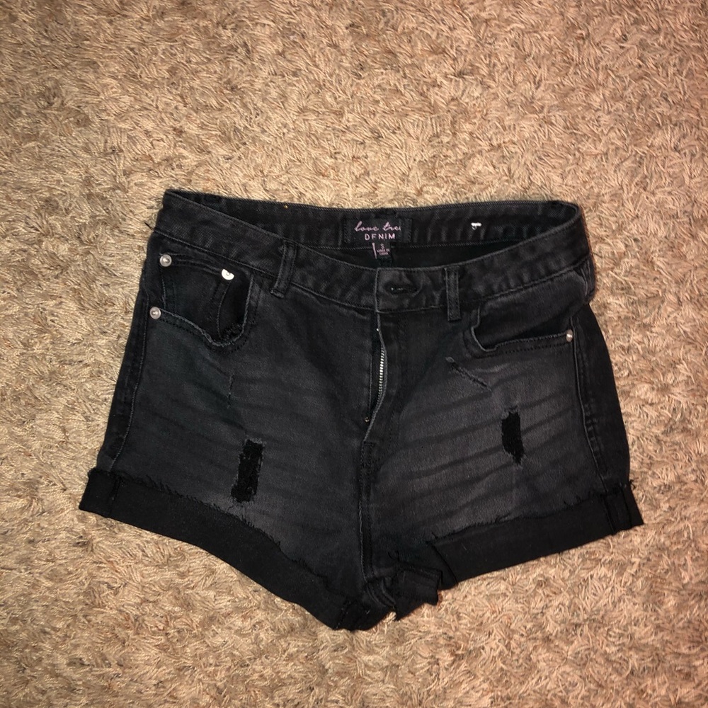 Black ripped shorts